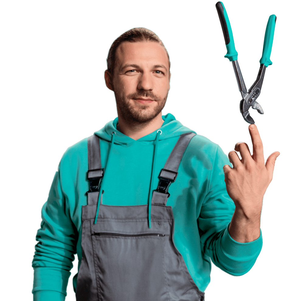 Instalator Vaillant trzyma narzędzie podczas rozmowy o systemie ogrzewania.